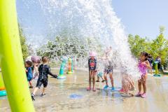 Kids playing at a water park