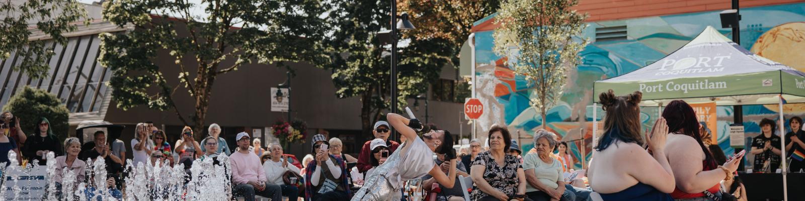 Pride in PoCo event with people gathered in Leigh Square