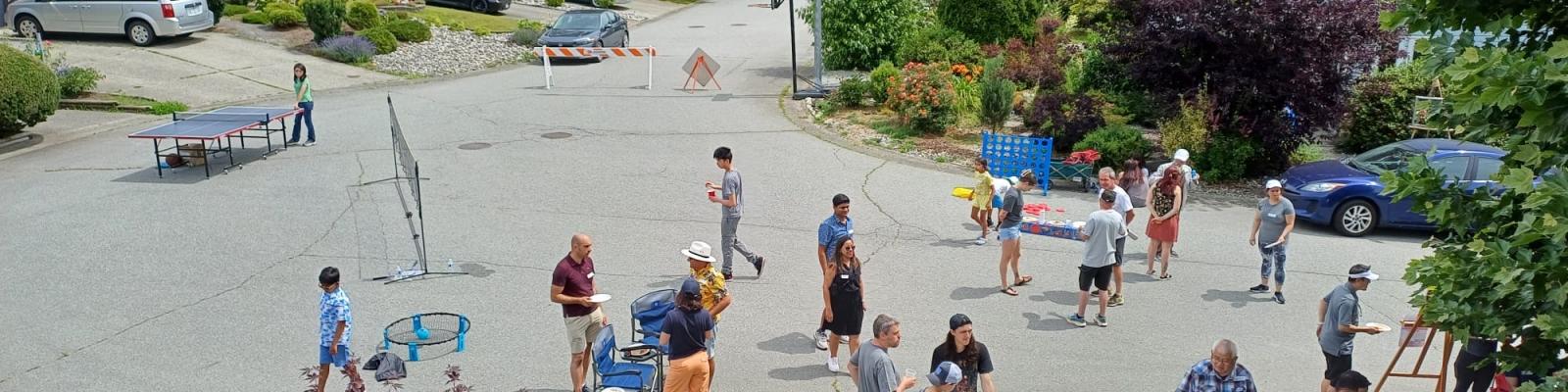 people on street having a block party