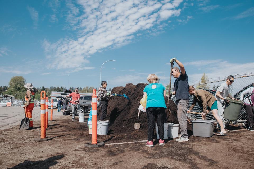 residents collecting free compost