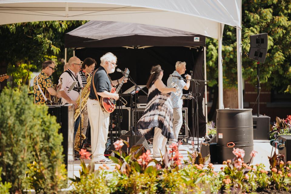 musicians on stage at Leigh Square