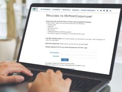 Laptop screen showing MyPortCoquitlam online web portal