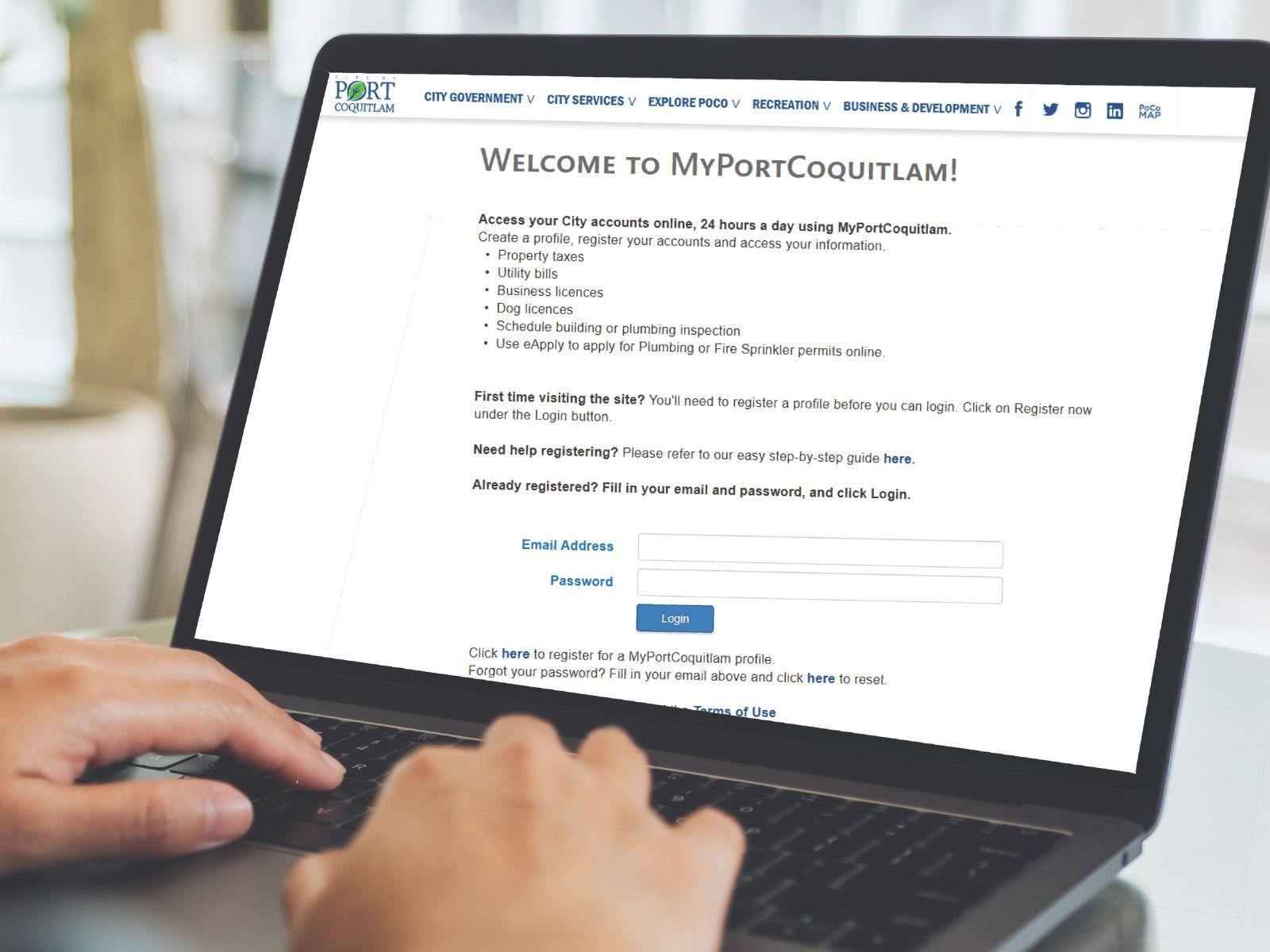 Laptop screen showing MyPortCoquitlam online web portal